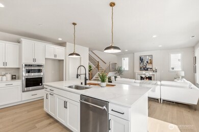 Interior photos are of the Sheridan model home at Maywood Heights. Same floor plan but colors and finishes will vary. Photos are for illustration purposes only.