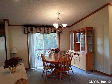 Dining Room. Sliding door leads to back deck.
