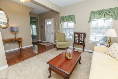 Spacious Living Room with plenty of light to let t