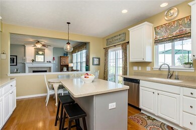 Kitchen view with Family/Hearth Room beyond.