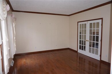 Peaceful living room or office with French doors t