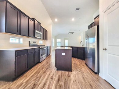 Kitchen featuring appliances with stainless steel