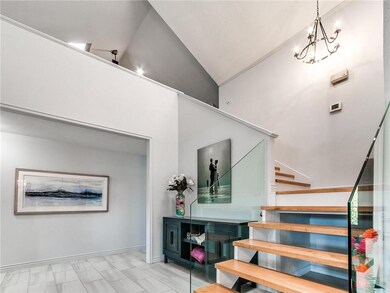 View of loft, condo has 2 skylights to add natural