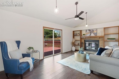 Great room with wood burning fireplace, just steps