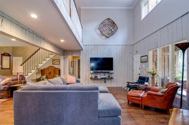 Large den overlooking the perfect back yard!