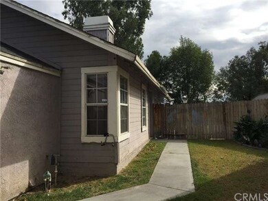 walkway at side of home to main entrance