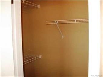 WALK-IN CLOSET IN MASTER BEDROOM