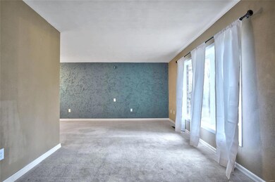 Immediately to your right as you enter is your spacious living room.