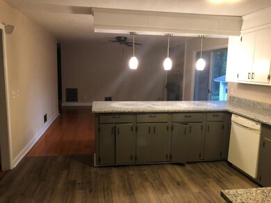 Open space to family room w/ fireplace