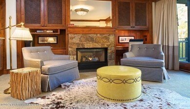 6 - Sitting Area + Fireplace