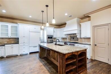The kitchen is amazing with a huge island with she