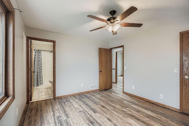 10930 Sumter Ave N - Web Quality - 019 - 18 2nd Floor Primary Bedroom.jpg