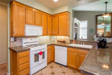 Nicely done kitchen with granite counter tops.  Lo