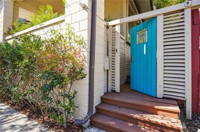 Side entrance from the front that leads toward the
