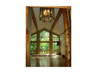 Entrance view, floor to ceiling windows brings the