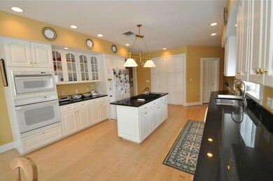 The kitchen has radiant heat floors,...