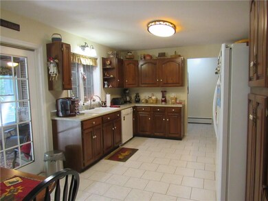 Bright and cheery kitchen.  Window over sink looks