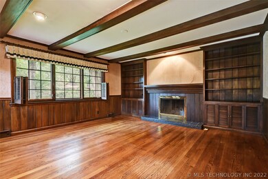 ALSO, ORIGINAL WOOD PANELING, BOOKSHELVES, AND A W