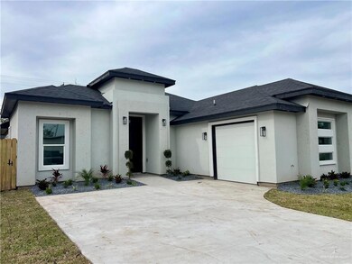 Prairie-style house with a garage