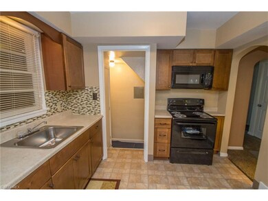 Door leads to breezeway to the left and basement t