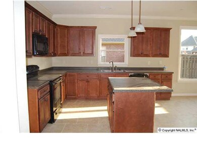 Roomy kitchen with an open plan to breakfast area. Great flow for a house full of company but each space is defined for an intimate environment.