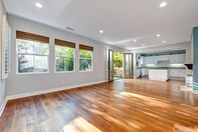 Custom lighting and an open flowing floor plan 