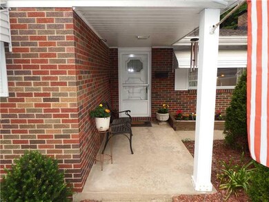 Exterior Front. An inviting porch welcomes you int
