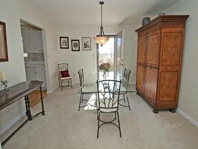 Dining Room. Opens to the covered rear balcony wit