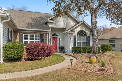 Traditional-style house featuring brick siding, a 