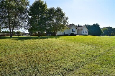 Updated low maintenance Ranch home situated on over half an acre that's fenced.