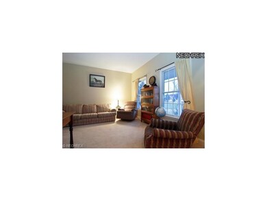 Spacious living room that opens to family room and