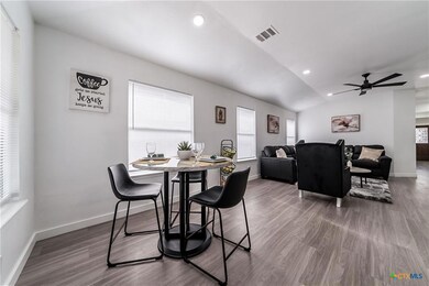 Dining room featuring visible vents, baseboards, 