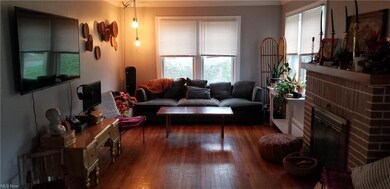 Friont room has beautiful hardwood floors througho