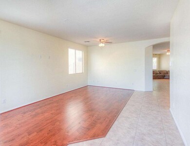 Foyer to formal living and dining