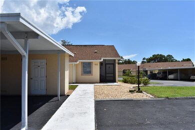 Carport with storage area for bikes, golf clubs an