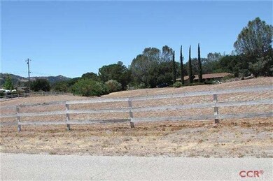 Beautiful large corner lot with room for horses.