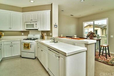Kitchen opens to dining room.