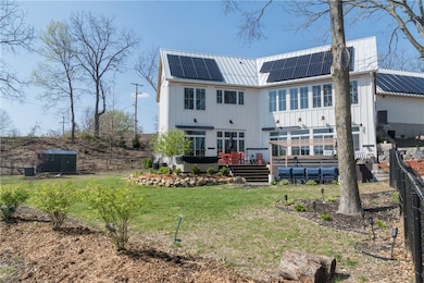 Exterior of House & back of property, lake side.