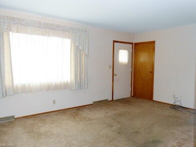 Nice size living room as you walk in the front doo