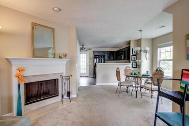 Highlighting the fireplace dining area and kitchen