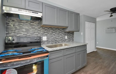 Kitchen with stainless steel appliances.