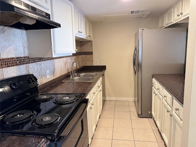 Galley-style kitchen featuring a newly installed s