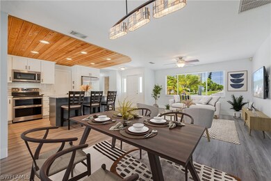 Dining room featuring wooden ceiling, ceiling fan,