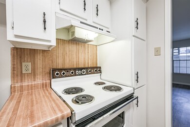 There is a four burner electric range and single o
