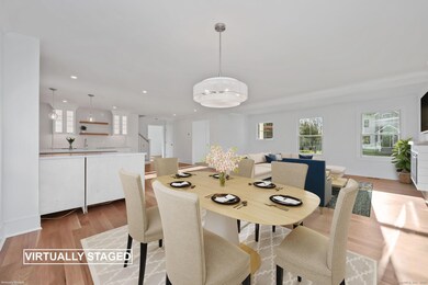 Seamlessly integrated w/the kitchen, the dining ar
