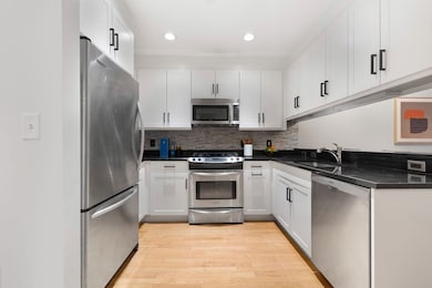 Folio Boston unit 303, Boston, MA 02110 - photo 2