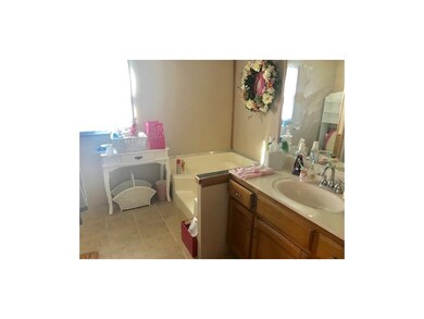 1308 N Ward Rd, Raymore, MO 64083 - photo 3