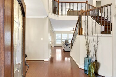 Leaded glass door will welcome you in. Soaring ceilings in foyer create the dramatic entrance you are looking for!