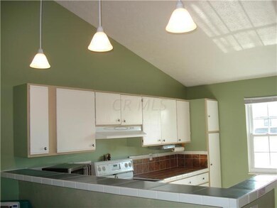 Kitchen with vaulted ceiling