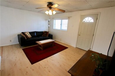 Spacious Living Room with laminate flooring.  Grea